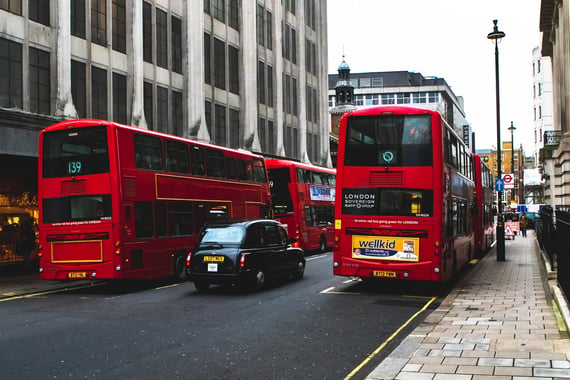 A group of UK buses on the roads, which have different types of security in place. 
